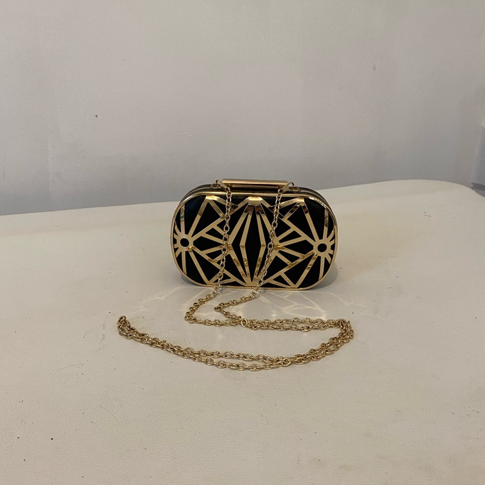 Gold detail clutch with chain